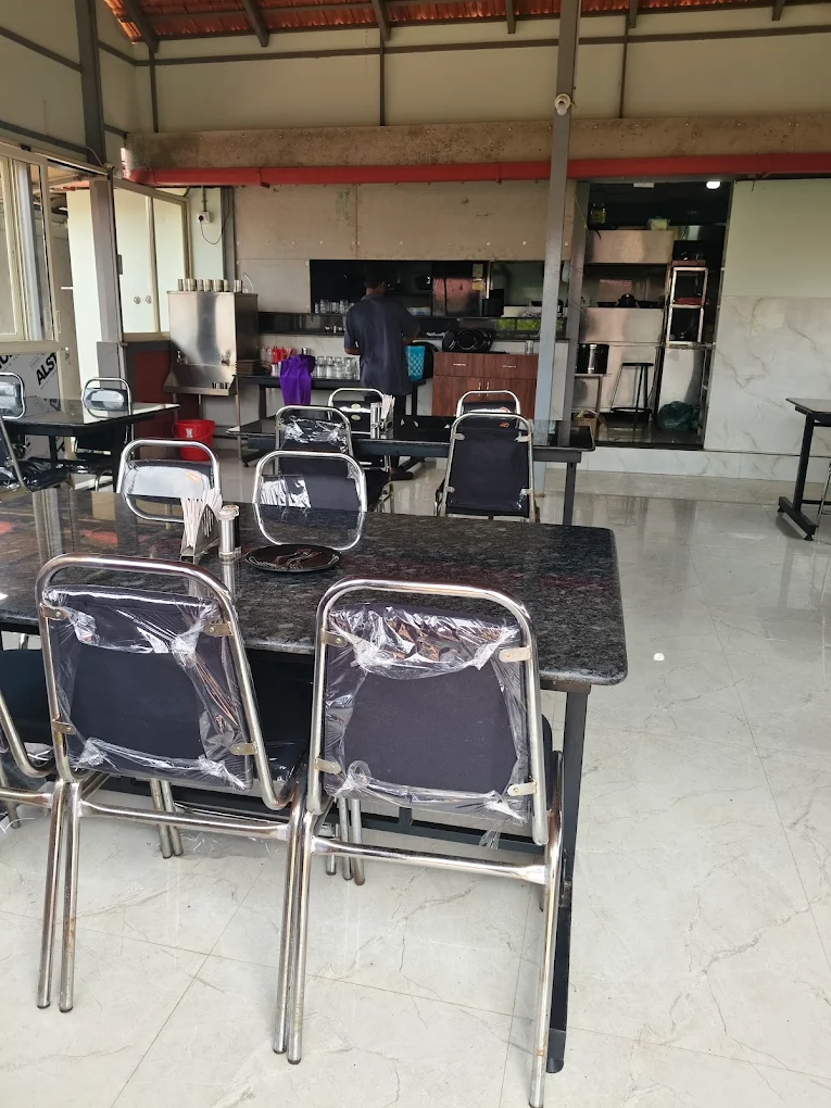 Restaurant dining space at Hotel New Chalukya G.K.V